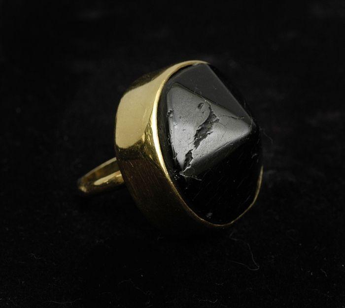 Appraisal: Gold and Carved Stone Ring