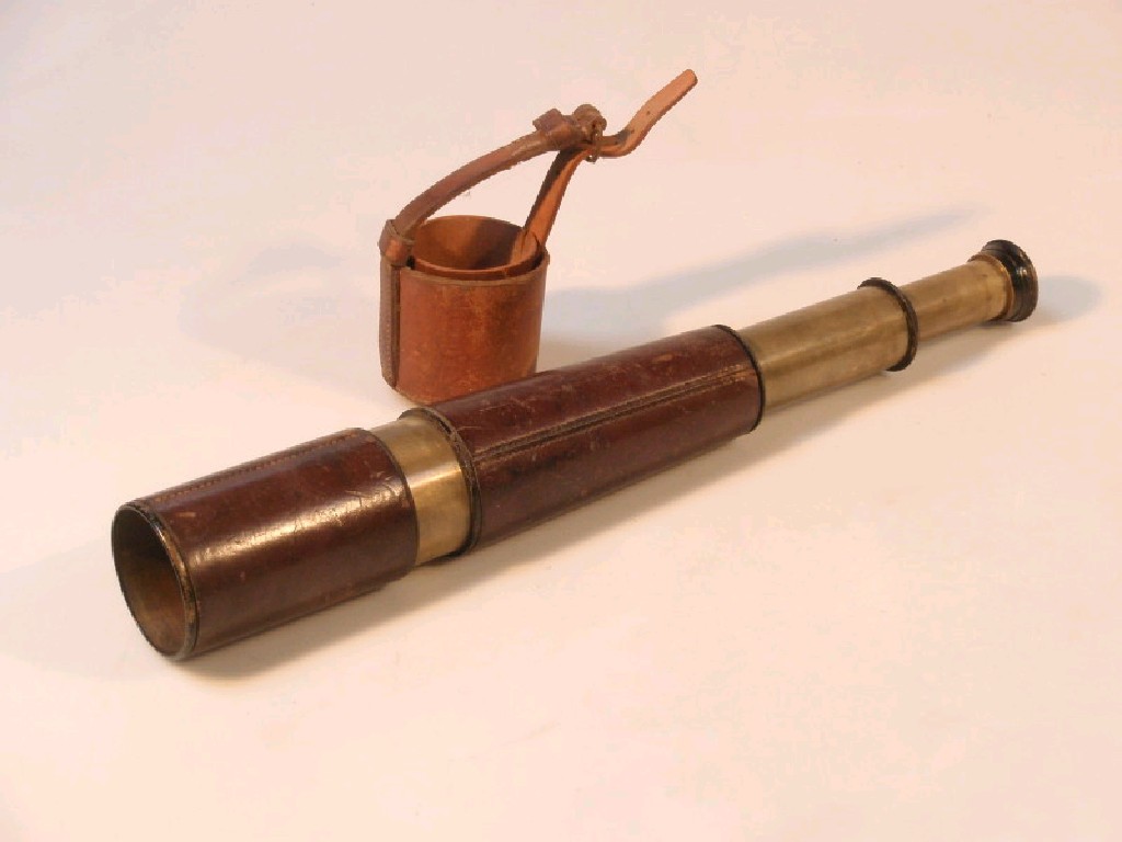 Appraisal: Three draw brass telescope with leather grip and cover stamped