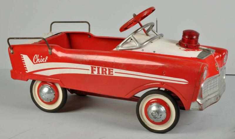 Appraisal: Murray Lancer Fire Chief Car Pedal Toy Description s Pressed