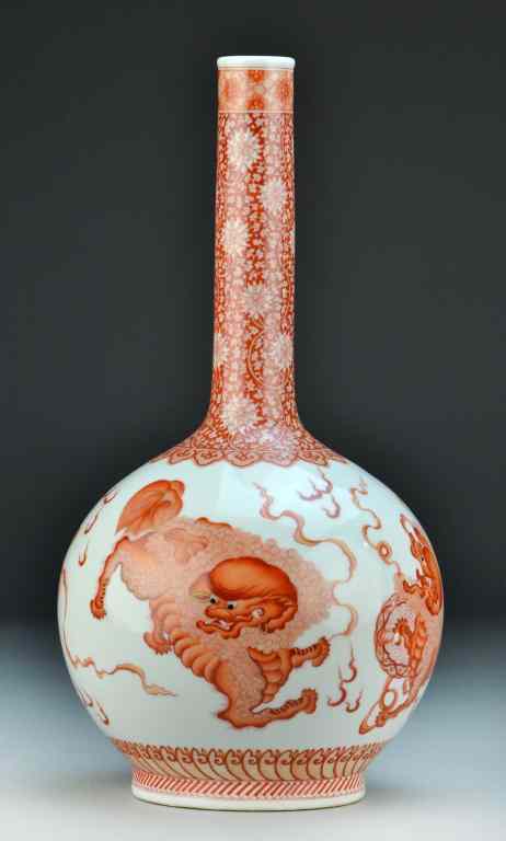 Appraisal: Chinese Iron Red Porcelain VaseOf elongated bottle form finely painted