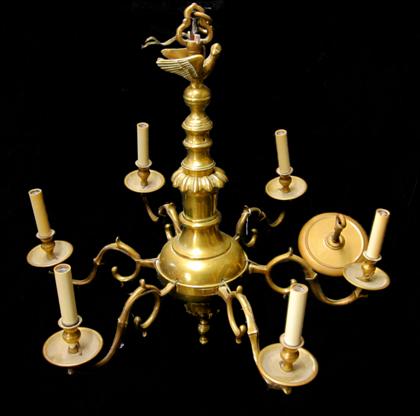 Appraisal: Brass chandelierA bird finial above a baluster standard with six