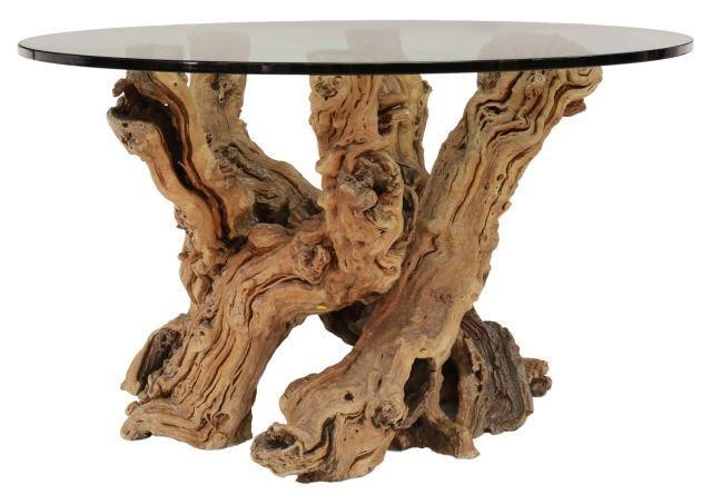 Appraisal: Rustic dining or center table having circular glass top naturalistic