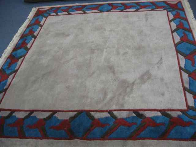 Appraisal: Chinese Handmade Sculptured Wool Rug teal brown and red on