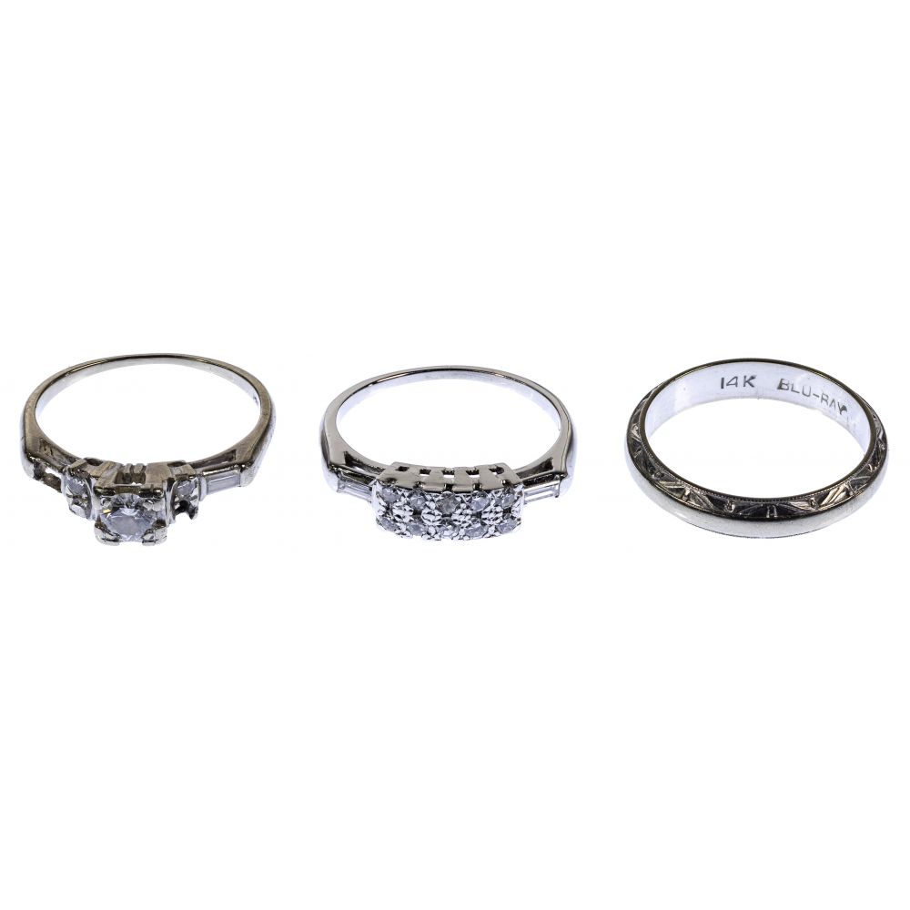 Appraisal: K WHITE GOLD AND DIAMOND RINGS rings including a textured