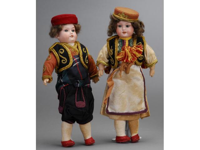 Appraisal: Armand Marseille Eastern European Boy and Girl Germany ca both