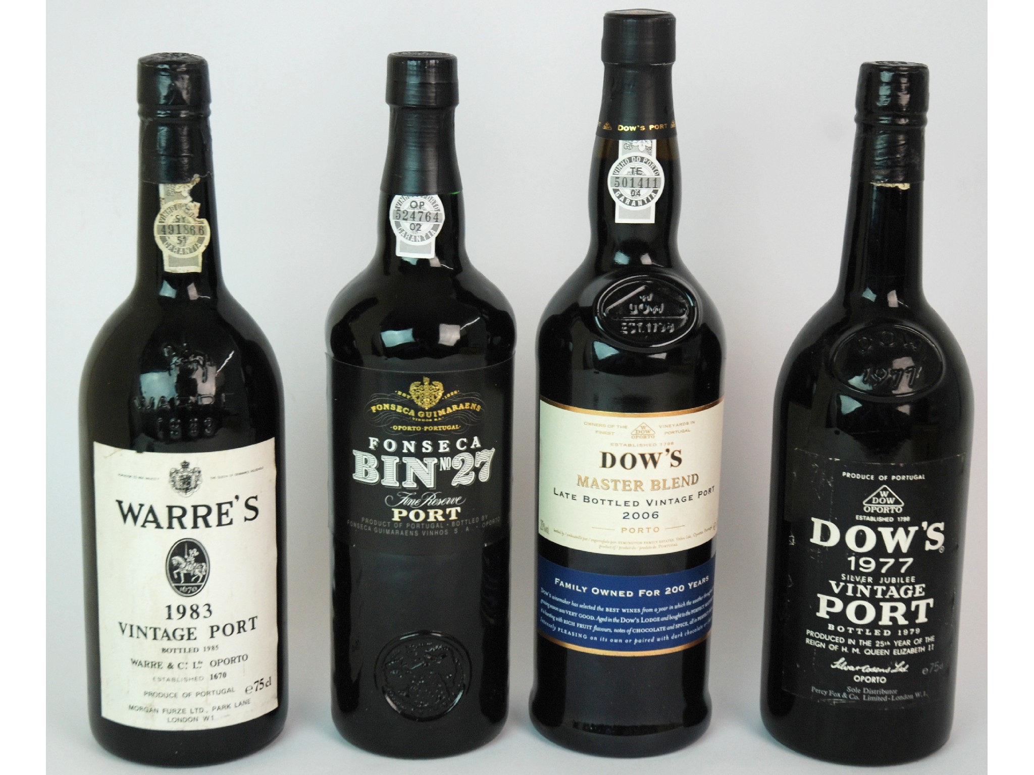 Appraisal: Four various bottles of Portcomprising Fonseca bin no in wooden