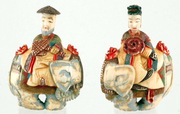 Appraisal: Pair of Chinese carved ivory figural snuff bottles Polychrome male