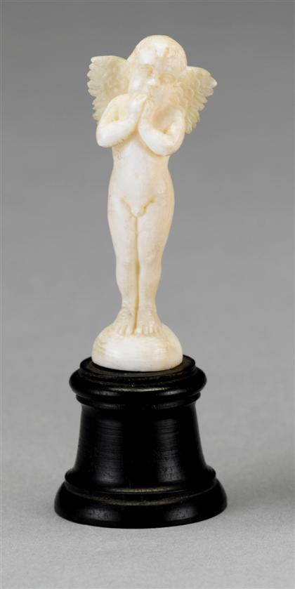 Appraisal: Small Continental ivory figure late th century Depicting a standing