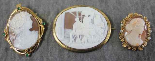 Appraisal: Cameo Lot Including Brooches Includes a cameo brooch depicting a