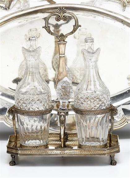 Appraisal: French silver neoclassical cruet stand paris circa The flattened central