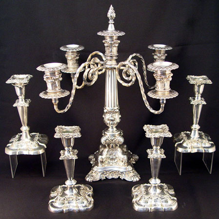 Appraisal: SILVERPLATE CANDELABRA AND SIDE CANDLE STICKS Impressive Wilcox Silverplate light