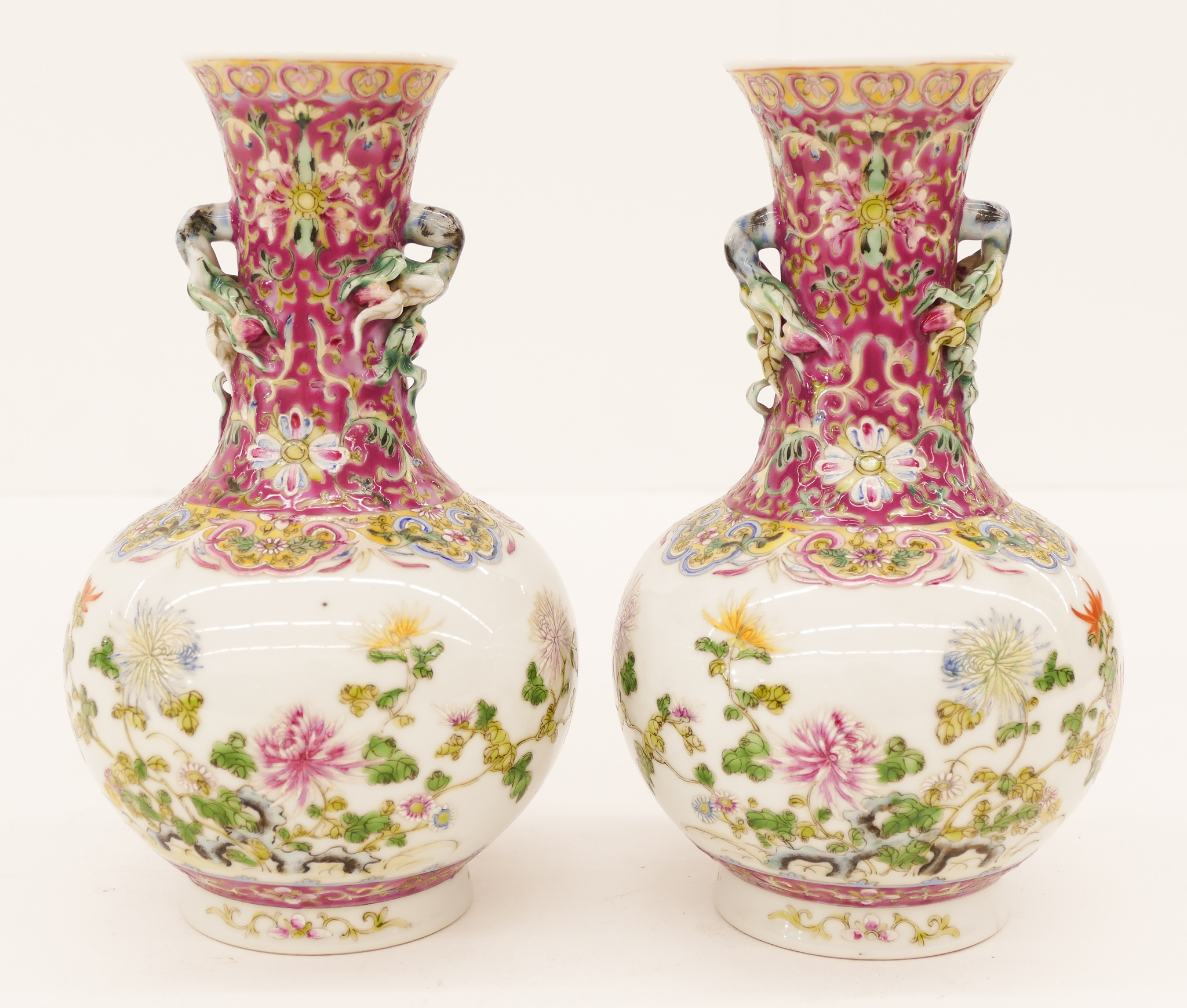 Appraisal: Pair Chinese Famille Rose Handled Porcelain Vases ''x '' Polychrome