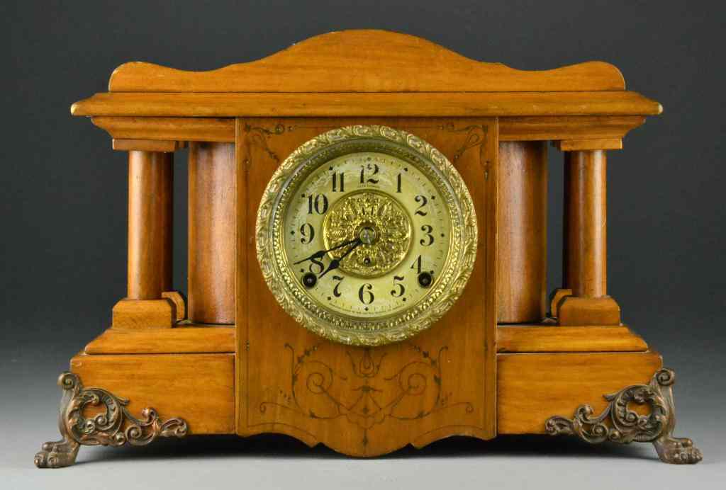 Appraisal: A Seth Thomas Wood And Metal Mantle ClockHaving a metal