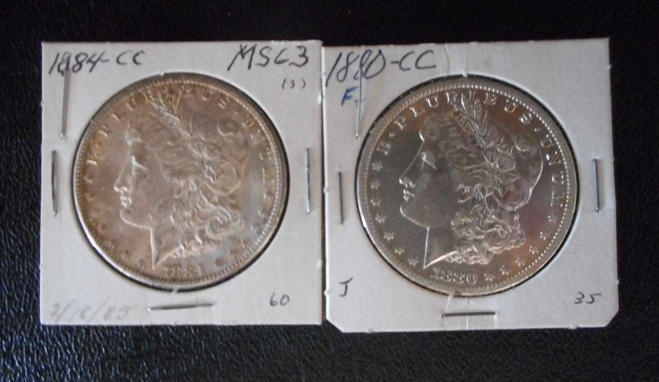 Appraisal: TWO CARSON CITY SILVER MORGAN DOLLARS -CC and -CC