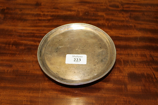 Appraisal: A GEORGE III SILVER CARD TRAY with beaded edge standing