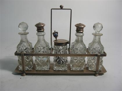 Appraisal: English silver and glass condiment set th century Including a