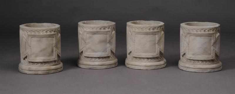 Appraisal: SET OF FOUR NEOCLASSICAL STYLE CAST STONE JARDINI RES Each