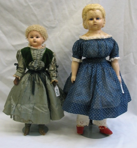 Appraisal: TWO TH CENTURY COLLECTIBLE DOLLS One is a wax shoulder