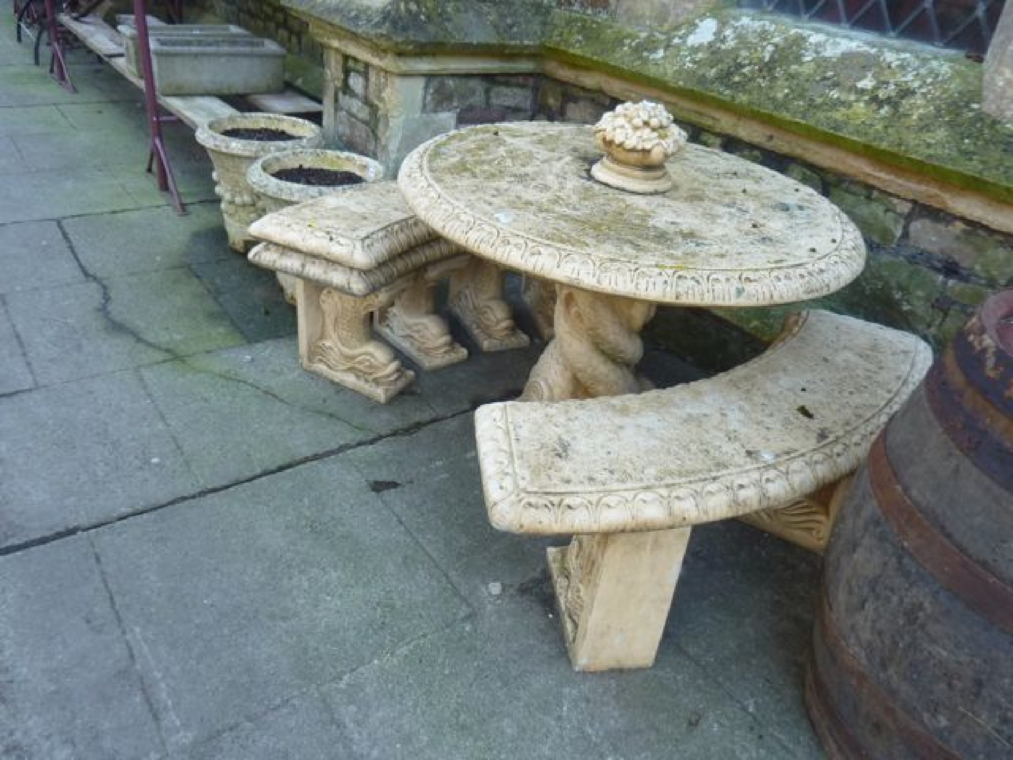 Appraisal: A contemporary cast composition stone garden table of circular form