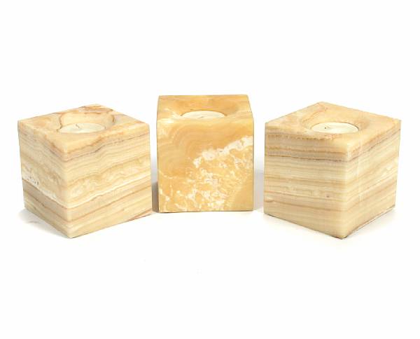 Appraisal: Three Onyx Candleholders Each carved from a single block of