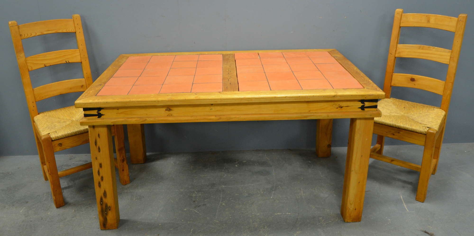 Appraisal: Pine framed and tiled table with a set of four