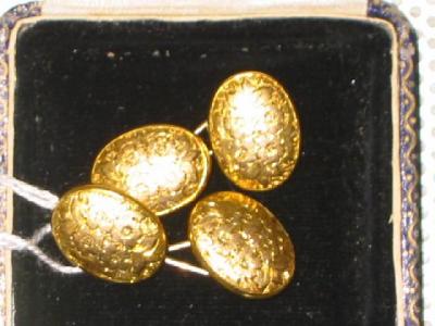 Appraisal: A PAIR OF VICTORIAN CT GOLD CUFFLINKS comprising two floral