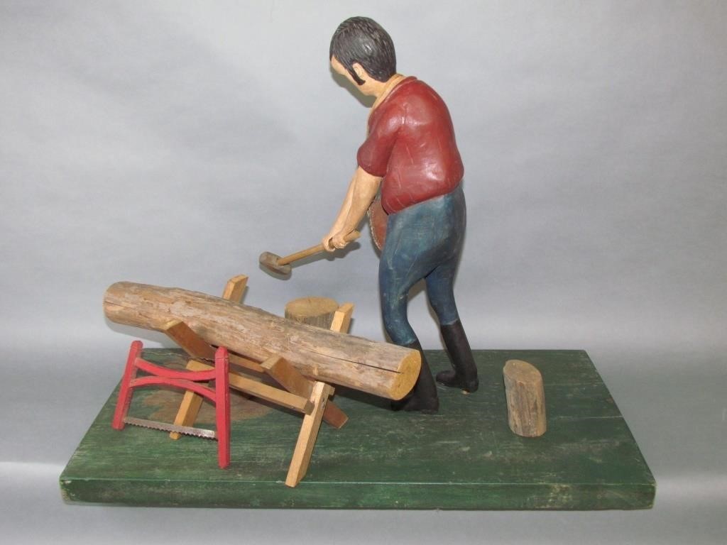 Appraisal: LARGE WALTER JUNE GOTTSHALL LUMBERJACK CARVINGwith sawbuck saw and several