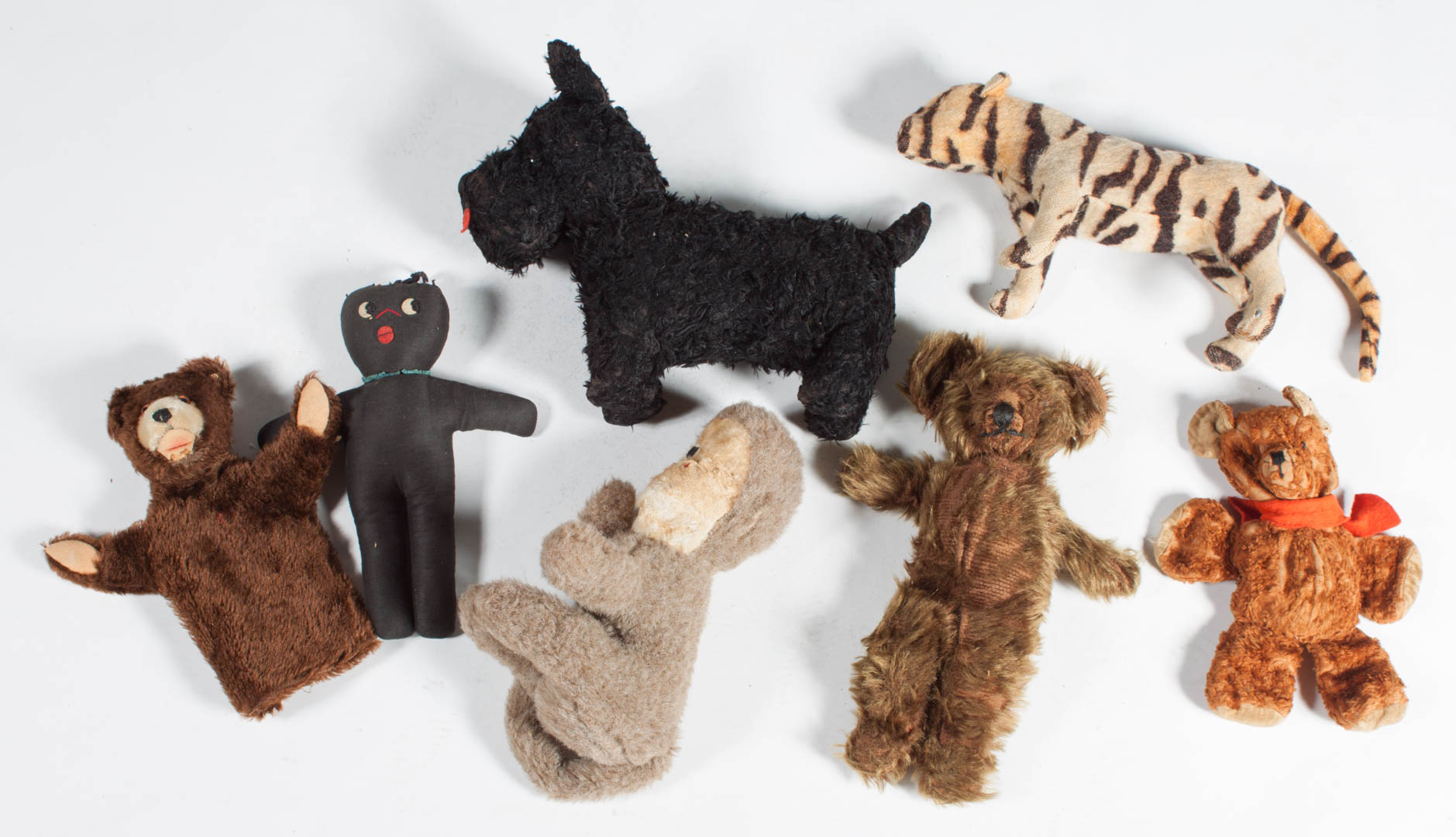 Appraisal: Seven early plush animals s- s includes Stieff bear hand