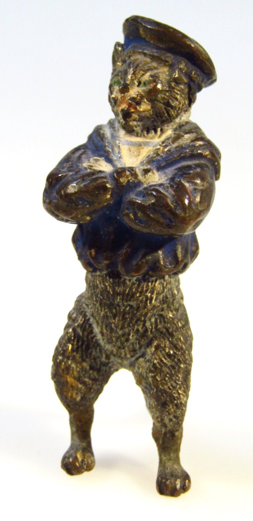 Appraisal: An early thC cold painted bronze humorous figure of a