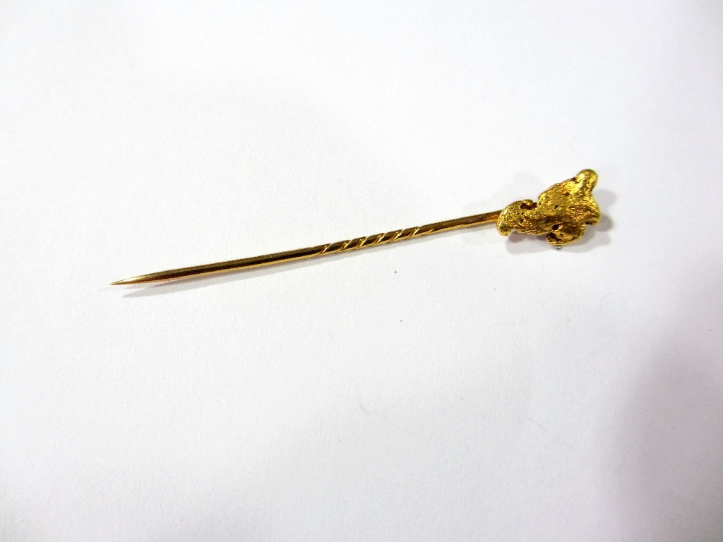 Appraisal: A natural gold nugget set as a stick pin in