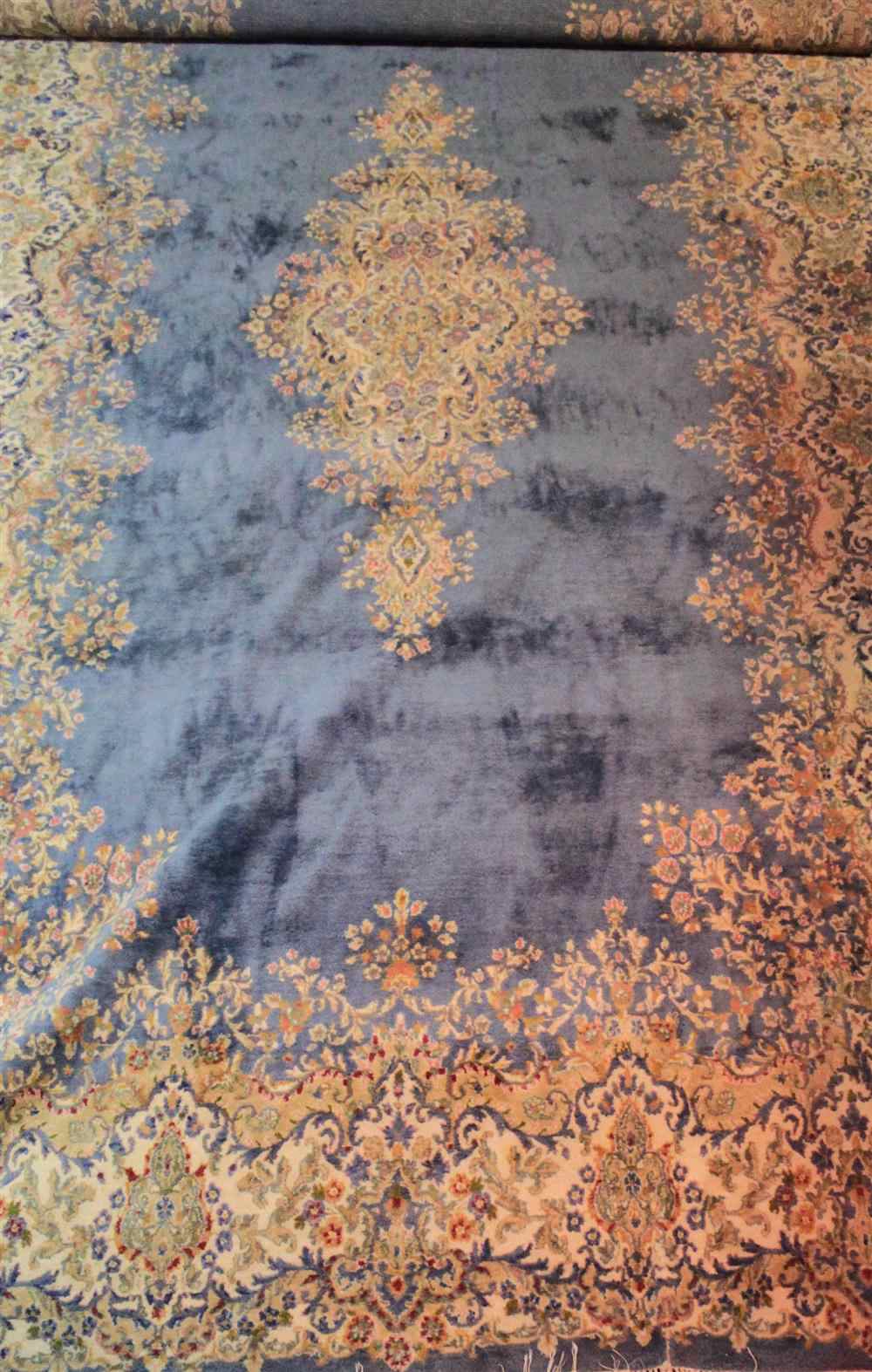 Appraisal: LARGE BLUE KIRMAN CAUCASIAN DOUBLE MEDALLION AND A BOKHARA RUGS