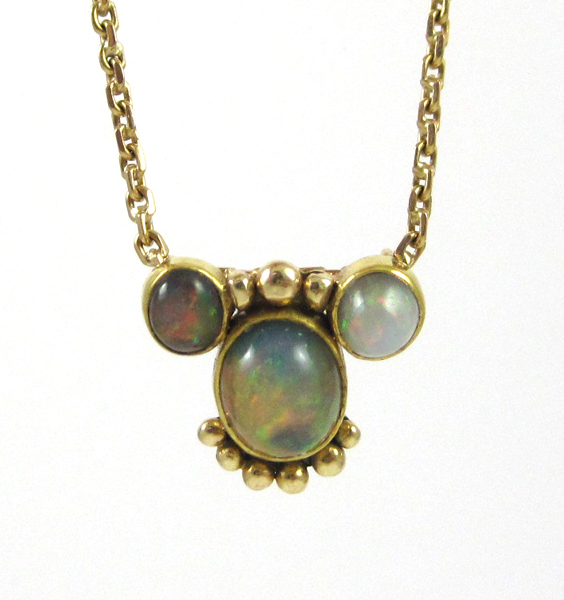 Appraisal: OPAL AND YELLOW GOLD PENDANT NECKLACE suspended on a -