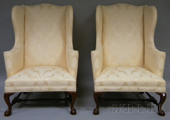 Appraisal: Pair of Chippendale-style Ivory Damask Upholstered Mahogany-finished Carved Wood Wing