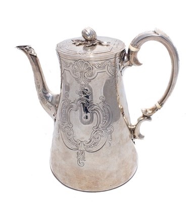 Appraisal: A Victorian silver hot water jug the body with engraved