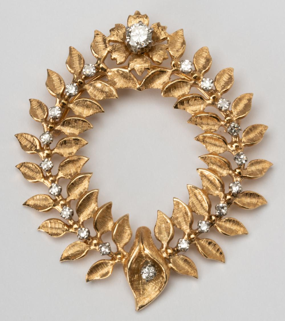 Appraisal: KARAT YELLOW GOLD DIAMOND WREATH BROCHThe karat yellow gold brooch