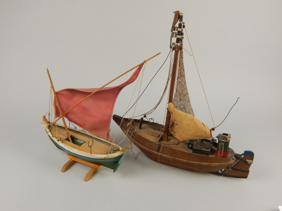 Appraisal: Two scale models of fishing boats each with sails rigging