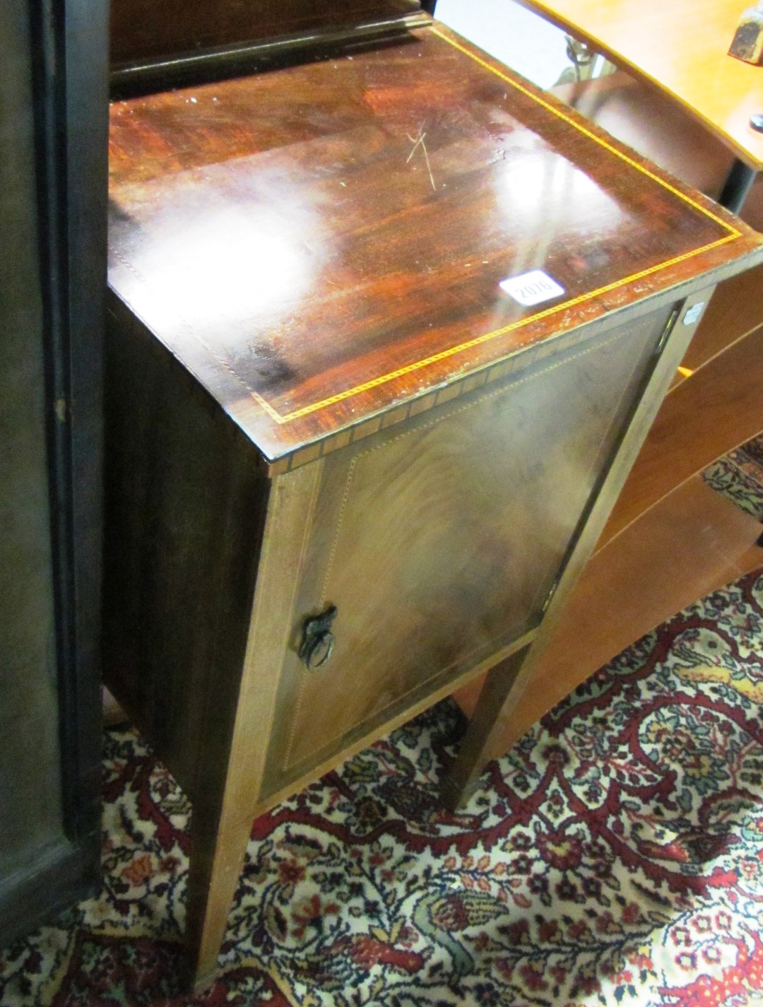 Appraisal: A th century mahogany and line inlaid pot cupboard and