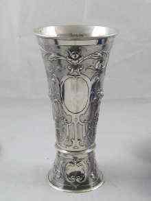 Appraisal: A German silver vase with chased and embossed decoration bearing