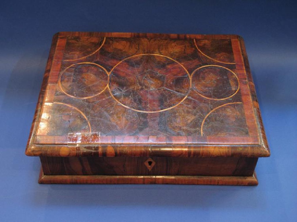 Appraisal: A QUEEN ANNE OYSTER VENEERED GLOVE BOX the rectangular top