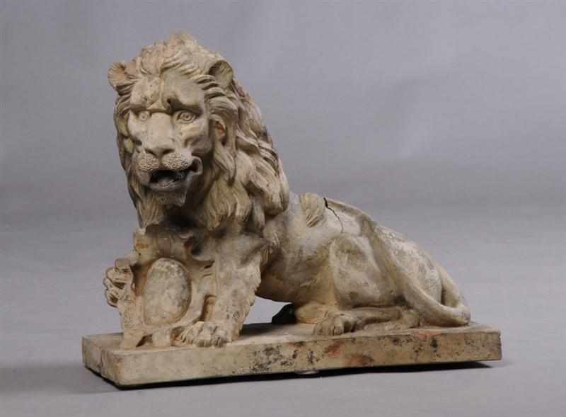 Appraisal: ITALIAN TERRACOTTA LION The demi rampant lion fitted with an