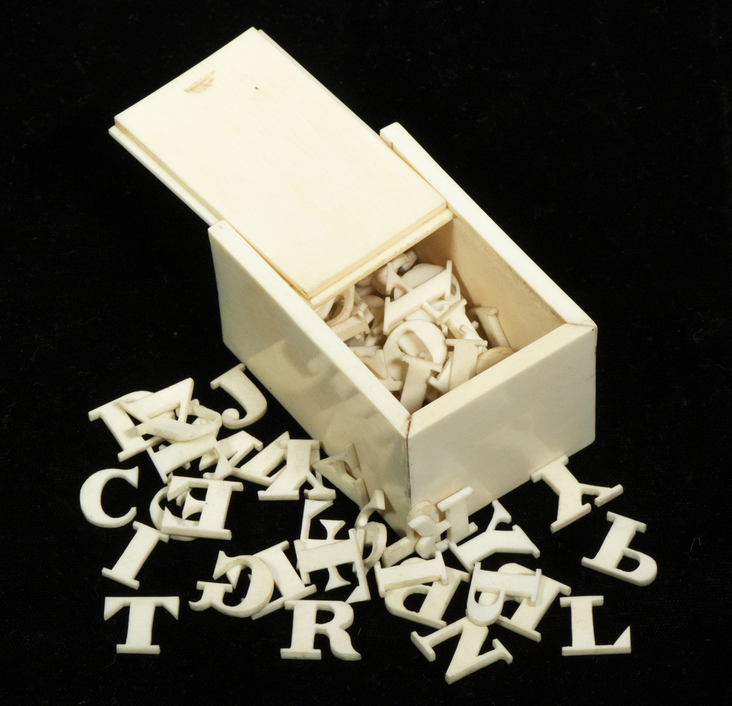 Appraisal: TH C BOX OF IVORY ALPHABET LETTERS Miniature Box with