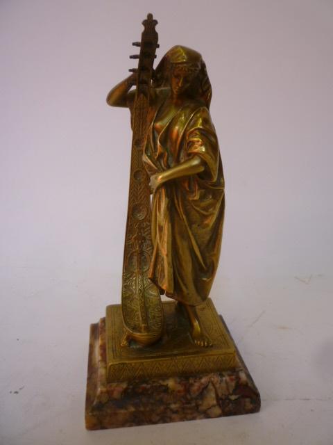 Appraisal: A BRONZE FIGURE possibly French early th century of a