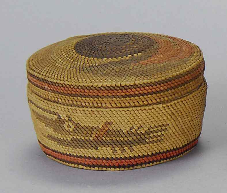 Appraisal: NORTHWEST COASTAL INDIAN COVERED BASKETCirca In circular form with red