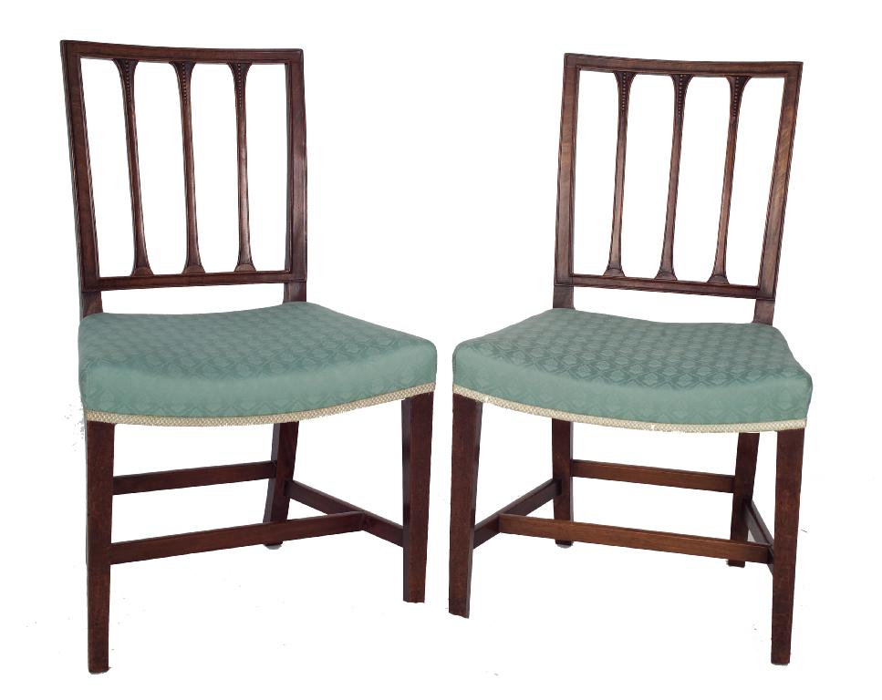 Appraisal: PAIR OF GEORGE III MAHOGANY DINING CHAIRS each with arcaded