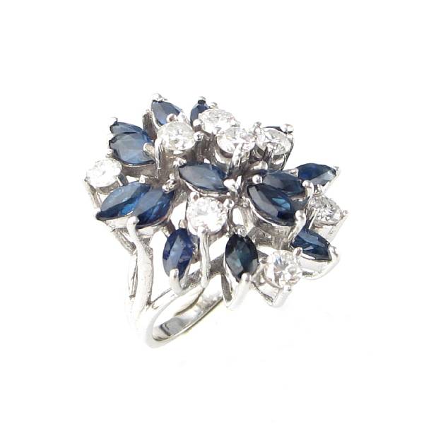 Appraisal: A sapphire diamond and gold cluster ring estimated total diamond