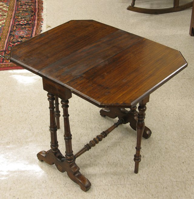 Appraisal: VICTORIAN ROSEWOOD SUTHERLAND TABLE English th century The narrow drop-leaf