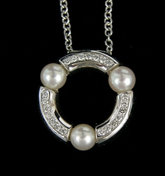 Appraisal: A Movado Necklace with Diamonds and Pearls Fashioned in k