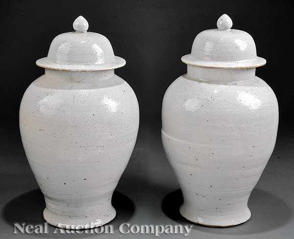 Appraisal: A Pair of Decorative Chinese White Glazed Porcelain Covered Jars