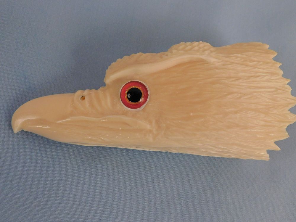 Appraisal: EAGLE HEAD CARVED WHALE TOOTH Fine carved whale tooth in