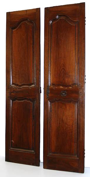 Appraisal: A pair of Louis XV carved walnut doors th century